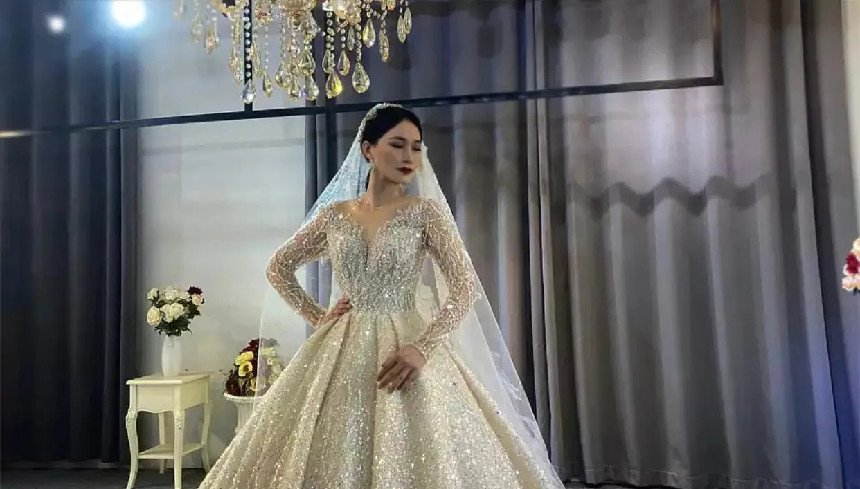 Sure! The optimized title for this e-commerce product could be Exquisite New Full Beaded Luxury Wedding Gown.