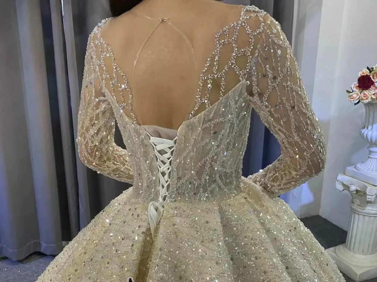 Sure! The optimized title for this e-commerce product could be Exquisite New Full Beaded Luxury Wedding Gown.